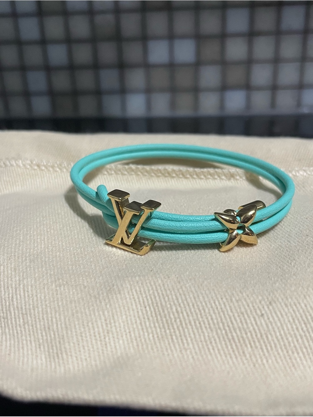 Louis Vuitton Turquoise Bloom Bracelet: Leather Wrap with Gold Charms
